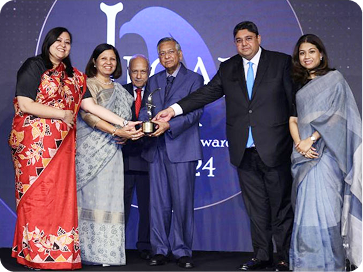 Aquilaw team receiving an award on stage