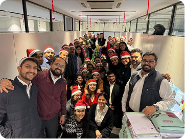 Aquilaw team celebrating together in the office