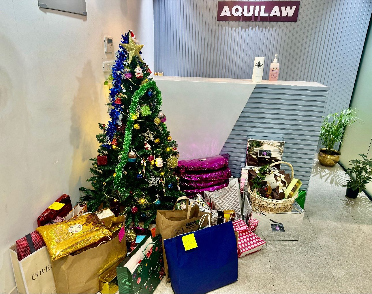 Christmas at AQUILAW has become a tradition of joy, collegiality, camaraderie, fun music, great food & the best Secret Santa !
